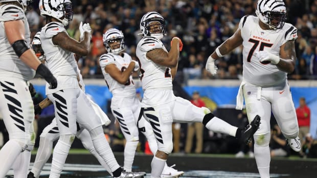 Cincinnati Bengals running back Joe Mixon (28) celebrates his touchdown score during the second quarter of a regular season NFL football matchup Monday, Dec. 4, 2023 at EverBank Stadium in Jacksonville, Fla. [Corey Perrine/Florida Times-Union]© Corey Perrine/Florida Times-Unio / USA TODAY NETWORK  